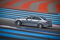 Mercedes AMG Driving Academy - Castelet - C63 AMG anthracite 3/4 arrière gauche filé penché