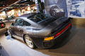 D'Ieteren Galerie - Porsche 959 noir 3/4 arrière gauche penché