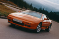 Lotus Esprit GT3 orange 3/4 avant gauche penché