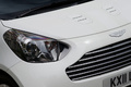 Aston Martin Cygnet blanc phare avant 2