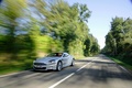 Aston Martin DBS gris 3/4 avant gauche travelling 5