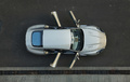 Aston Martin Rapide gris vue de haut portes ouvertes