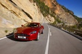 Aston Martin Rapide rouge 3/4 avant gauche travelling