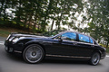 Bentley Continental Flying Spur Speed noir profil travelling penché