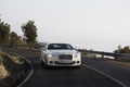 Bentley Continental GT 2010 blanc 3/4 avant droit travelling 2