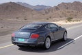 Bentley Continental GT anthracite 3/4 arrière droit travelling penché