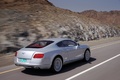 Bentley Continental GT gris 3/4 arrière droit travelling penché