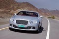 Bentley Continental GT gris face avant travelling penché