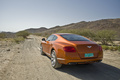 Bentley Continental GT orange 3/4 arrière gauche