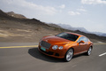 Bentley Continental GT orange 3/4 avant gauche travelling penché