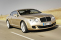 Bentley Continental GT Speed beige 3/4 avant droit travelling penché