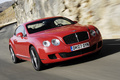 Bentley Continental GT Speed rouge 3/4 avant droit travelling penché