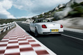 Bentley Continental Supersports Cabrio - blanc - 3/4 arrière gauche, dynamique