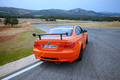 BMW M3 E92 GTS orange 3/4 arrière gauche