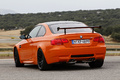 BMW M3 E92 GTS orange 3/4 arrière gauche