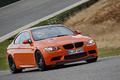 BMW M3 E92 GTS orange 3/4 avant droit filé penché 4