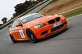 BMW M3 E92 GTS orange 3/4 avant droit travelling penché 2