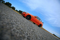 BMW M3 E92 GTS orange 3/4 avant gauche penché