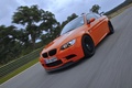 BMW M3 E92 GTS orange 3/4 avant gauche travelling penché 2
