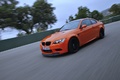 BMW M3 E92 GTS orange 3/4 avant gauche travelling penché 3