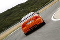 BMW M3 E92 GTS orange face arrière travelling penché