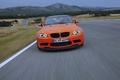 BMW M3 E92 GTS orange face avant travelling penché 5