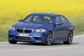 BMW M5 2011 bleu 3/4 avant gauche penché 3