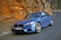 BMW M5 2011 bleu 3/4 avant gauche travelling penché 3