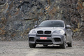 BMW X6 M anthracite 3/4 avant gauche