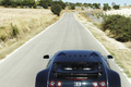 Bugatti Veyron Super Sport bleu/gris face arrière travelling vue de haut debout