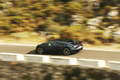Bugatti Veyron Super Sport carbone bleu 3/4 arrière gauche filé penché vue de haut
