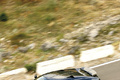 Bugatti Veyron Super Sport carbone bleu 3/4 avant gauche filé vue de haut debout