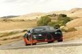 Bugatti Veyron Super Sport noir/orange 3/4 avant droit filé penché