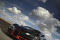 Bugatti Veyron Super Sport noir/orange 3/4 avant gauche travelling penché debout