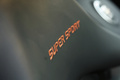 Bugatti Veyron Super Sport noir/orange logo siège