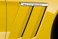 Chevrolet Corvette C6 Grand Sport jaune logo aile debout