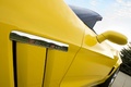 Chevrolet Corvette C6 Grand Sport jaune logo aile