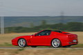 Ferrari 575 SuperAmerica rouge 3/4 arrière gauche filé