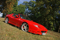 Ferrari 575 SuperAmerica rouge 3/4 avant droit penché
