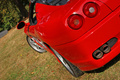Ferrari 575 SuperAmerica rouge aile arrière gauche