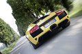 Lamborghini Murcielago LP640 jaune face arrière travelling penché
