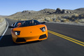 Lamborghini Murcielago LP640 Roadster orange face avant travelling penché