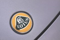 Lotus Evora grise vue badge.