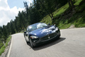 Maserati GranTurismo bleu face avant travelling penché