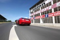 Maserati GranTurismo MC SportLine rouge 3/4 arrière gauche travelling penché 2