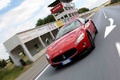 Maserati GranTurismo MC SportLine rouge 3/4 avant gauche travelling penché debout