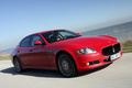 Maserati Quattroporte Sport GT S rouge 3/4 avant droit travelling penché