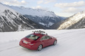 Mercedes CLS 4Matic - rouge - dans la neige, 3/4 arrière droit