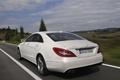 Mercedes CLS 500 blanc 3/4 arrière gauche travelling