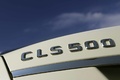 Mercedes CLS 500 blanc logo coffre